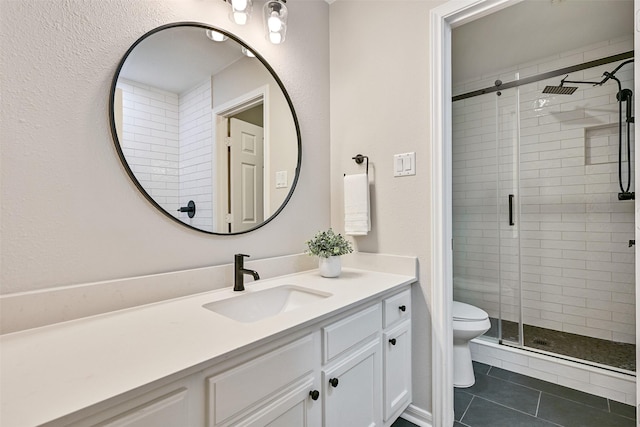 1405 Blueberry Ln, Friendswood, TX 77546 - bathroom featuring toilet, vanity, a stall shower, and tile patterned flooring