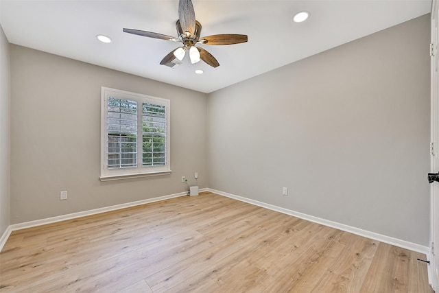 1405 Blueberry Ln, Friendswood, TX 77546 - empty room with ceiling fan, baseboards, light wood-style floors, and recessed lighting