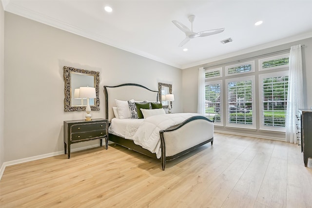 1405 Blueberry Ln, Friendswood, TX 77546 - bedroom featuring crown molding, light wood finished floors, recessed lighting, ceiling fan, and baseboards