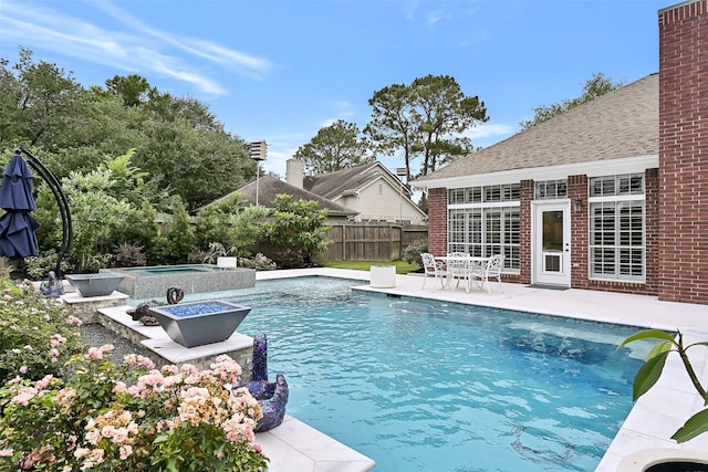 1405 Blueberry Ln, Friendswood, TX 77546 - view of pool with an in-ground hot tub and a patio area