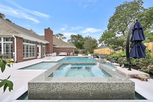 1405 Blueberry Ln, Friendswood, TX 77546 - view of swimming pool with an in-ground hot tub, a patio, a fenced backyard, and an outdoor hangout area