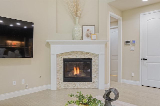 16815 Bornish Hill Ct, Humble, TX 77346 - detailed view of a high end fireplace, wood finished floors, and baseboards