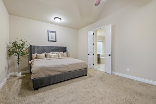 16815 Bornish Hill Ct, Humble, TX 77346 - carpeted bedroom with baseboards, ensuite bathroom, lofted ceiling, and a ceiling fan