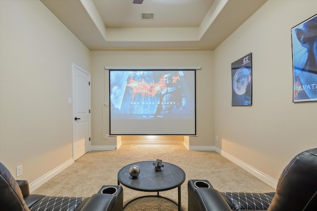 16815 Bornish Hill Ct, Humble, TX 77346 - home theater room featuring carpet, a tray ceiling, and baseboards