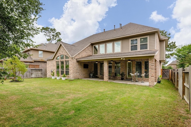 16815 Bornish Hill Ct, Humble, TX 77346 - back of house featuring brick siding, a patio, and a shingled roof