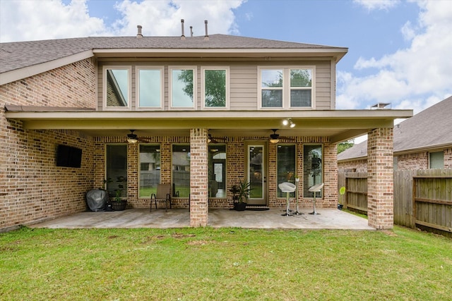 16815 Bornish Hill Ct, Humble, TX 77346 - back of house with ceiling fan, a patio area, and brick siding