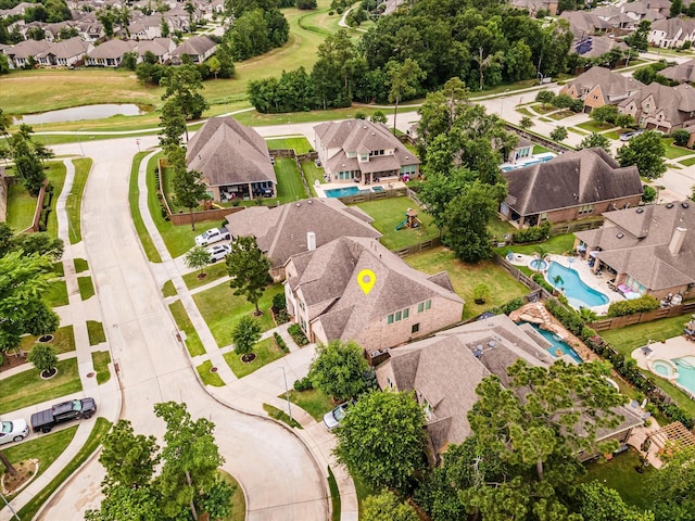 16815 Bornish Hill Ct, Humble, TX 77346 - aerial view of residential area with a nearby body of water and a pool area