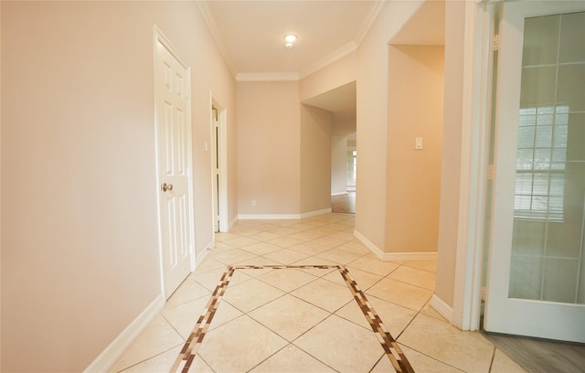 14106 Glen Canon Ln, Houston, TX 77069 - hallway featuring crown molding, baseboards, light tile patterned floors, and inlaid floor details