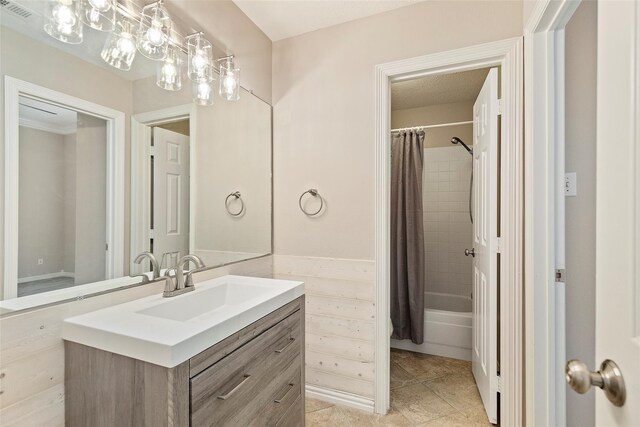 14106 Glen Canon Ln, Houston, TX 77069 - full bath featuring vanity, shower / tub combo with curtain, and tile patterned flooring