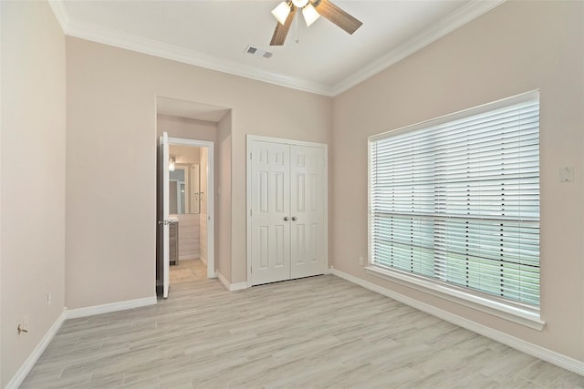 14106 Glen Canon Ln, Houston, TX 77069 - unfurnished bedroom featuring light wood-style floors, crown molding, baseboards, and multiple windows