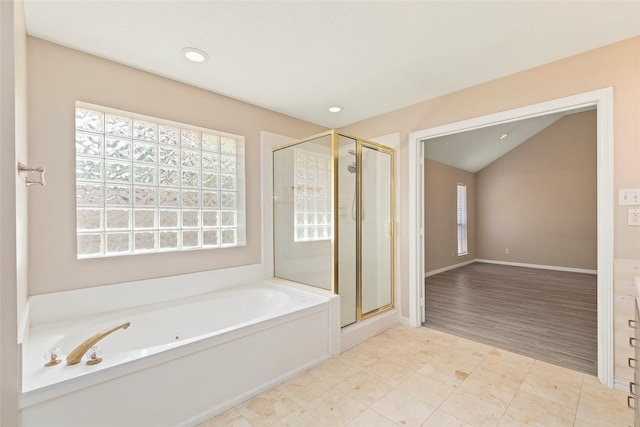 14106 Glen Canon Ln, Houston, TX 77069 - full bath featuring a bath, a shower stall, recessed lighting, and lofted ceiling