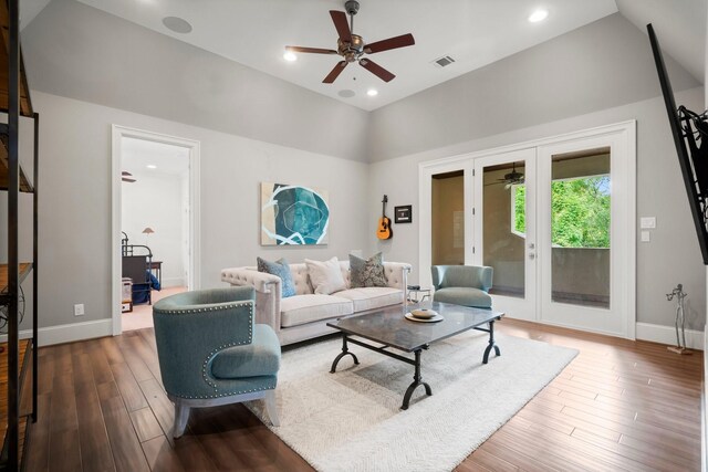 13 Honey Daffodil Pl, The Woodlands, TX 77380 - living room with a ceiling fan, wood finished floors, baseboards, vaulted ceiling, and recessed lighting