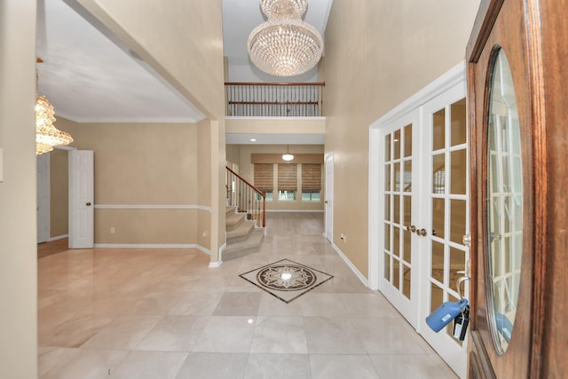 20902 Montana Bend Ln, Cypress, TX 77433 - entryway featuring a chandelier, french doors, stairway, baseboards, and crown molding