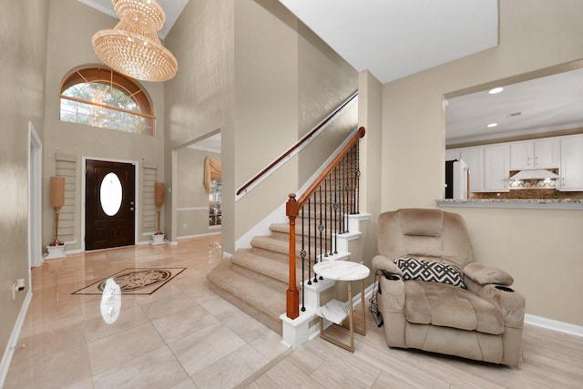 20902 Montana Bend Ln, Cypress, TX 77433 - entryway featuring baseboards, stairway, recessed lighting, and a high ceiling