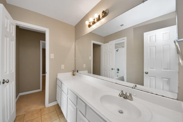 20902 Montana Bend Ln, Cypress, TX 77433 - bathroom with vanity, tile patterned floors, baseboards, and bathtub / shower combination