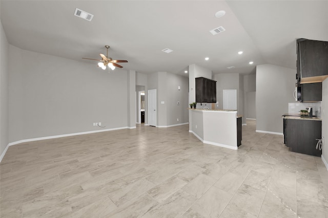 115 Clear Water St W, Montgomery, TX 77356 - unfurnished living room with ceiling fan, lofted ceiling, baseboards, and recessed lighting