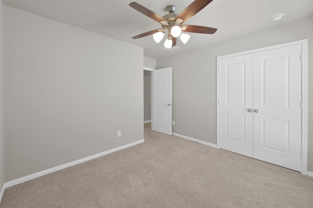 115 Clear Water St W, Montgomery, TX 77356 - unfurnished bedroom with carpet floors, a closet, baseboards, and ceiling fan