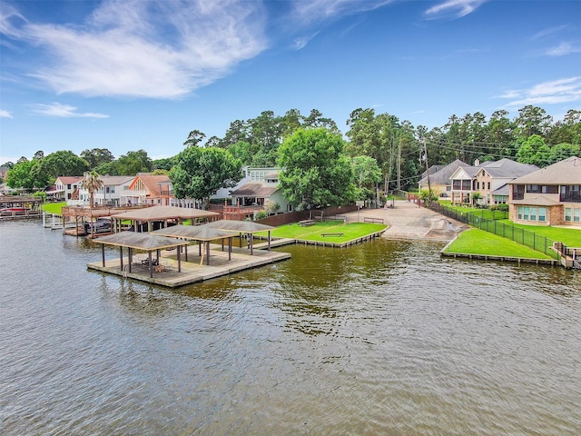 115 Clear Water St W, Montgomery, TX 77356 - dock area featuring boat lift, a residential view, and a water view