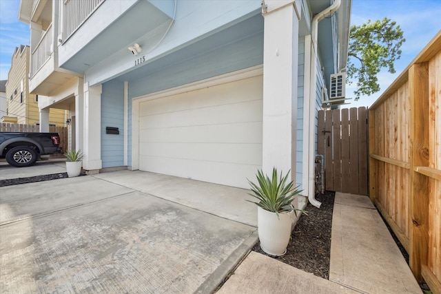 1115 E 27th St, Houston, TX 77009 - view of side of property with concrete driveway and a garage