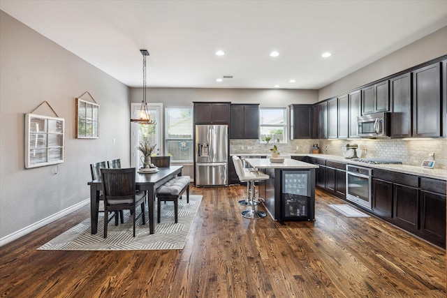 1115 E 27th St, Houston, TX 77009 - kitchen with stainless steel appliances, plenty of natural light, tasteful backsplash, and recessed lighting
