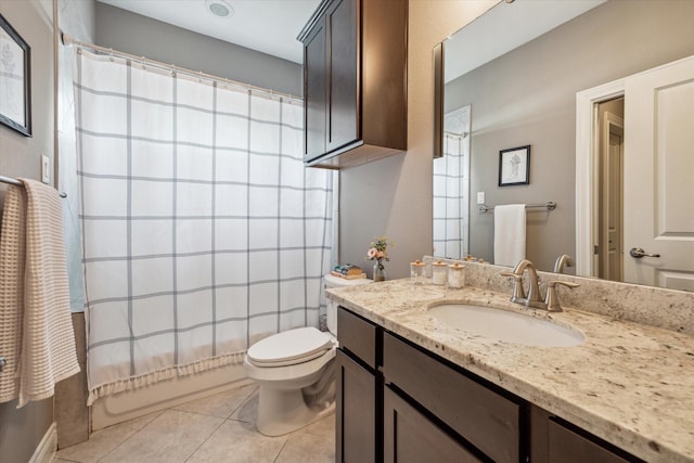 1115 E 27th St, Houston, TX 77009 - bathroom featuring tile patterned flooring, vanity, toilet, and shower / tub combo with curtain