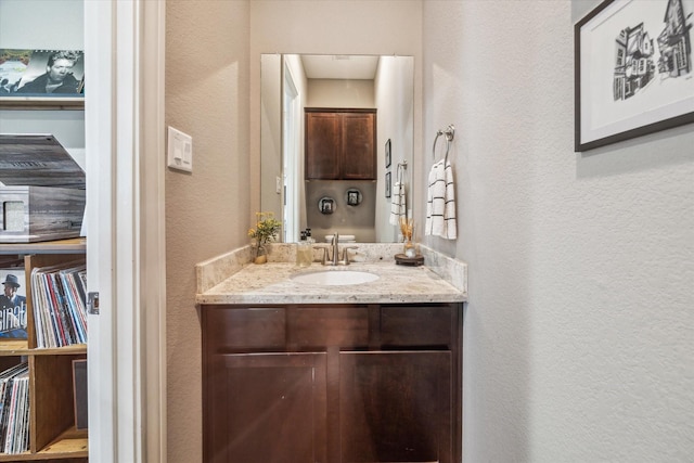 1115 E 27th St, Houston, TX 77009 - bathroom with a textured wall and vanity