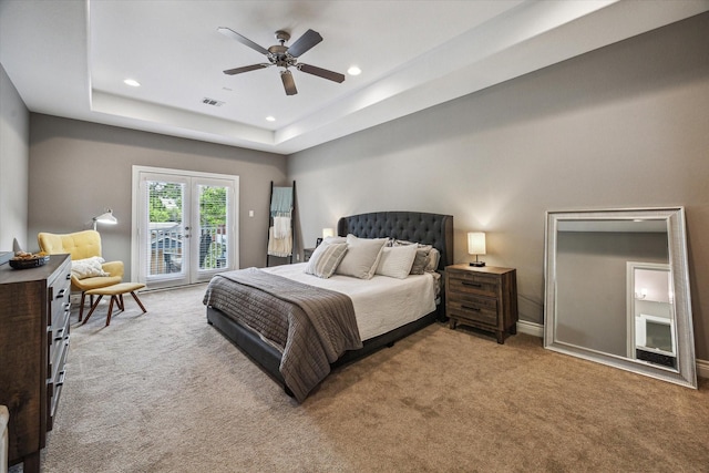 1115 E 27th St, Houston, TX 77009 - carpeted bedroom with access to outside, recessed lighting, baseboards, a tray ceiling, and ceiling fan