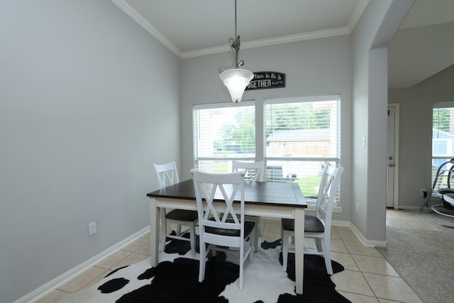301 Redwood St, Prairie View, TX 77445 - dining room featuring light tile patterned floors, crown molding, and baseboards