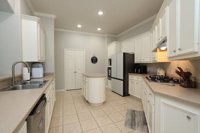 301 Redwood St, Prairie View, TX 77445 - kitchen featuring appliances with stainless steel finishes, a sink, under cabinet range hood, crown molding, and light tile patterned floors