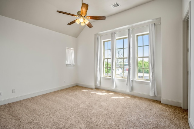 1217 E 28th St, Houston, TX 77009 - carpeted empty room featuring ceiling fan, baseboards, and lofted ceiling
