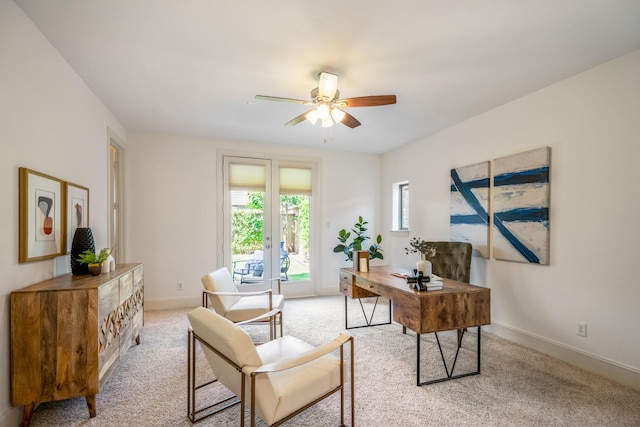 1217 E 28th St, Houston, TX 77009 - office featuring a ceiling fan, baseboards, and light colored carpet