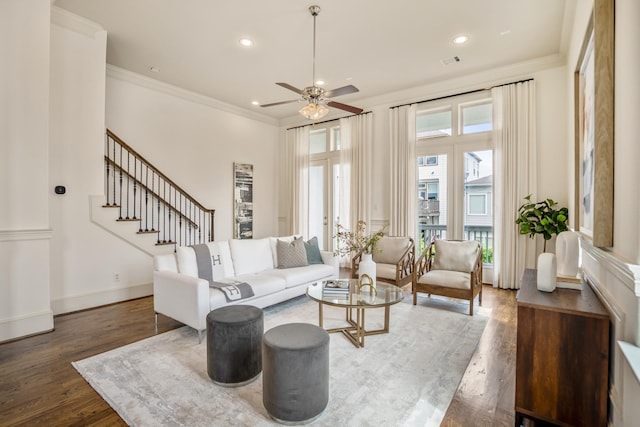 1217 E 28th St, Houston, TX 77009 - living room with a ceiling fan, ornamental molding, wood finished floors, recessed lighting, and stairs