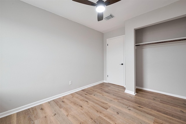 10260 Field Stone, Houston, TX 77041 - unfurnished bedroom featuring wood finished floors, baseboards, a closet, and a ceiling fan