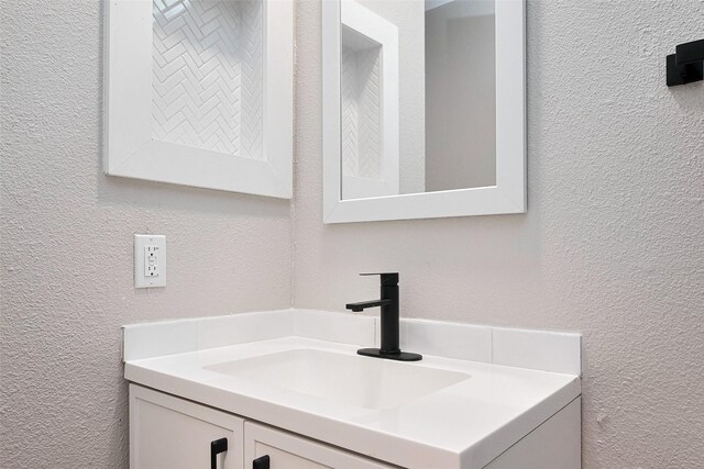 10260 Field Stone, Houston, TX 77041 - bathroom featuring vanity and a textured wall