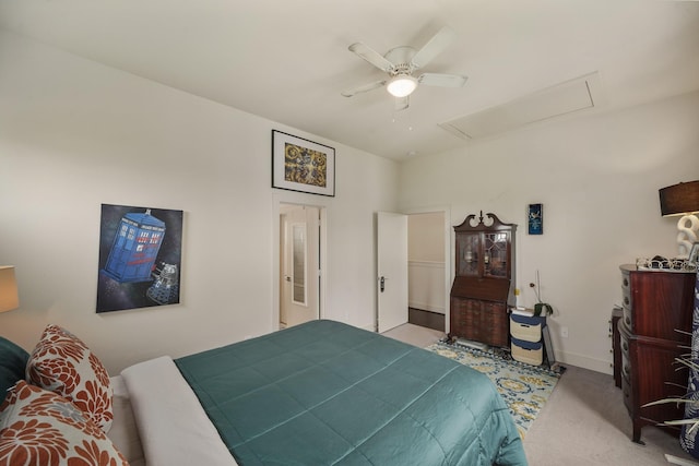 2210 Lou Ellen Ln Unit F, Houston, TX 77018 - bedroom featuring attic access, carpet, ceiling fan, and baseboards
