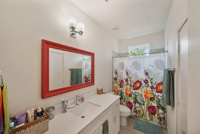 2210 Lou Ellen Ln Unit F, Houston, TX 77018 - bathroom with vanity, toilet, and tile patterned flooring