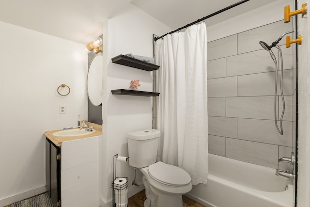 402 Teakwood Dr, Victoria, TX 77901 - full bath with vanity, toilet, shower / bath combination with curtain, and wood finished floors
