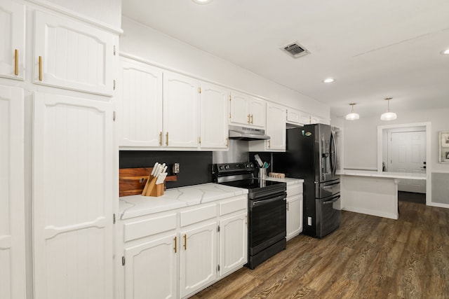 402 Teakwood Dr, Victoria, TX 77901 - kitchen featuring range with electric stovetop, under cabinet range hood, white cabinets, dark wood-type flooring, and stainless steel fridge with ice dispenser