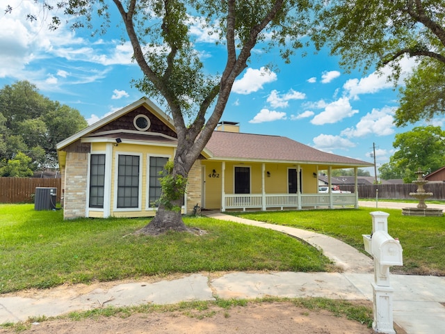 402 Teakwood Dr, Victoria, TX 77901 - view of front of house featuring a porch and central AC unit