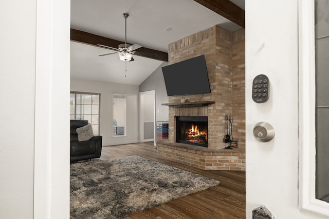402 Teakwood Dr, Victoria, TX 77901 - living area with a brick fireplace, wood finished floors, and ceiling fan