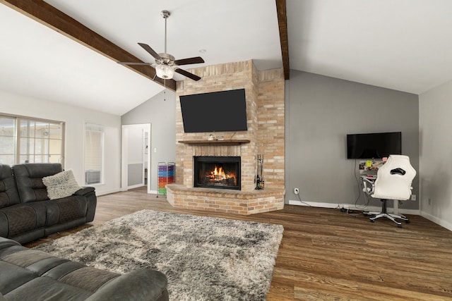 402 Teakwood Dr, Victoria, TX 77901 - living area with ceiling fan, wood finished floors, a brick fireplace, and baseboards