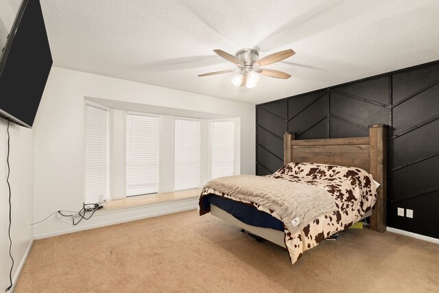 402 Teakwood Dr, Victoria, TX 77901 - carpeted bedroom with baseboards and a ceiling fan