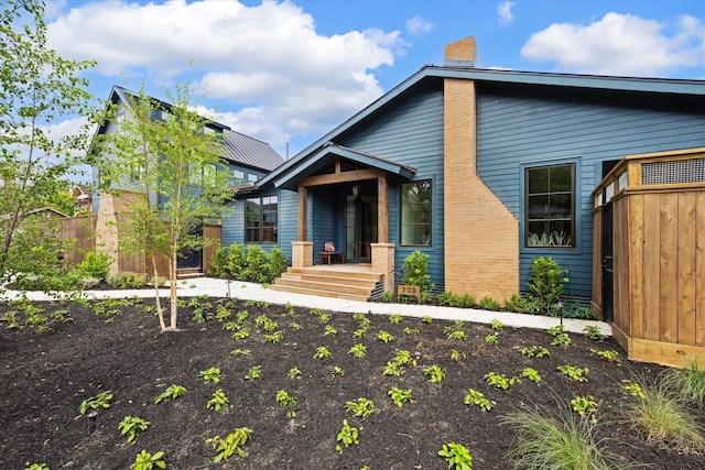 703 E 9th St, Houston, TX 77007 - view of front of house featuring a chimney
