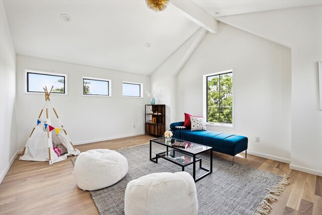703 E 9th St, Houston, TX 77007 - living area featuring light wood-style flooring and baseboards