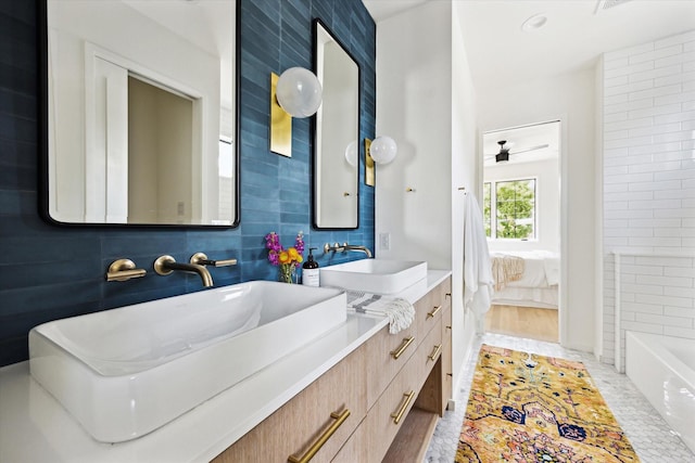 703 E 9th St, Houston, TX 77007 - bathroom with double vanity and connected bathroom