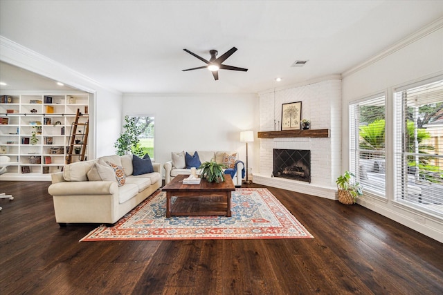 1318 N Gabriel River Cir, Sugar Land, TX 77478 - living room with healthy amount of natural light, wood finished floors, a ceiling fan, ornamental molding, and recessed lighting
