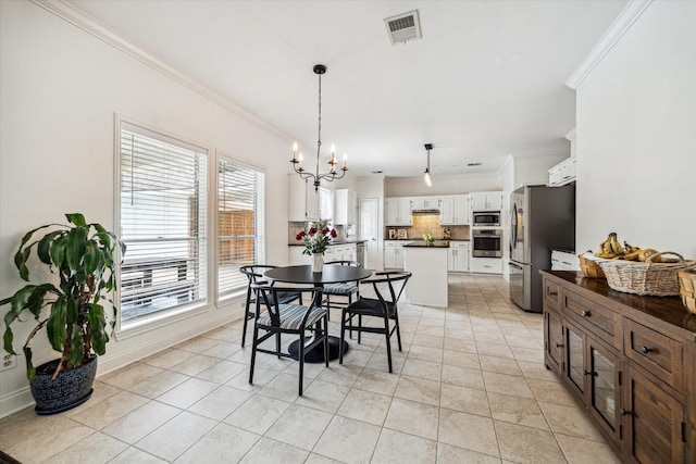 1318 N Gabriel River Cir, Sugar Land, TX 77478 - dining room with crown molding, a chandelier, baseboards, and light tile patterned flooring