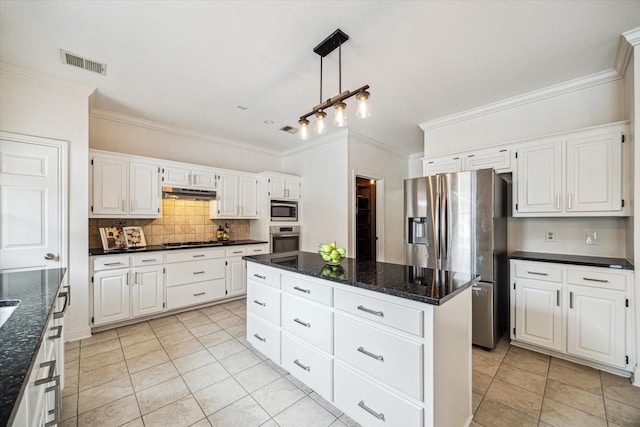 1318 N Gabriel River Cir, Sugar Land, TX 77478 - kitchen featuring appliances with stainless steel finishes, crown molding, backsplash, light tile patterned floors, and white cabinetry