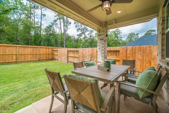 17542 Rosette Grass Dr, Conroe, TX 77385 - view of patio / terrace with ceiling fan and outdoor dining area