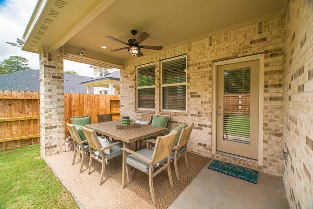 17542 Rosette Grass Dr, Conroe, TX 77385 - view of patio with a ceiling fan and outdoor dining area